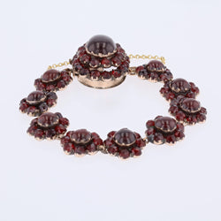 Yellow gold, silver, and garnet bracelet