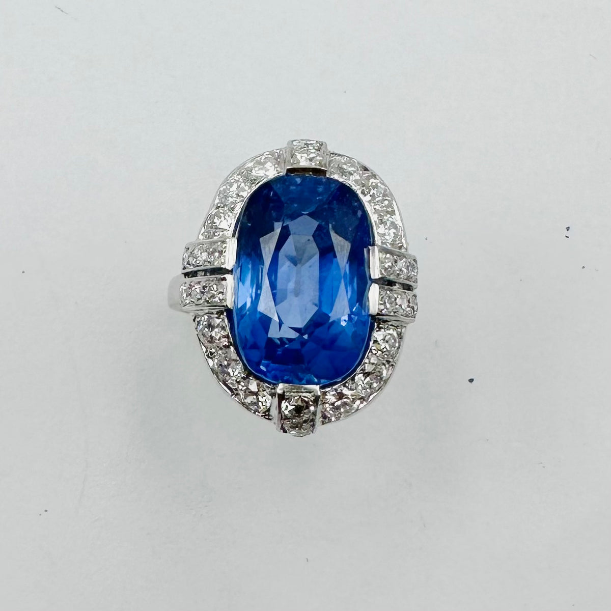 Entourage Ring in platinum, sapphire, and diamonds