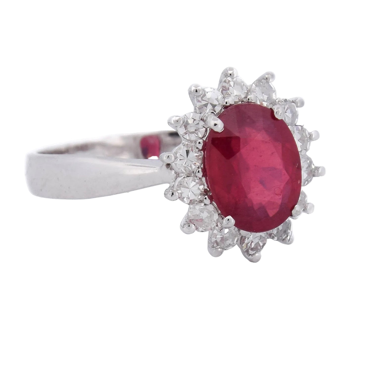 Entourage Ring in white gold, rubies, and diamonds