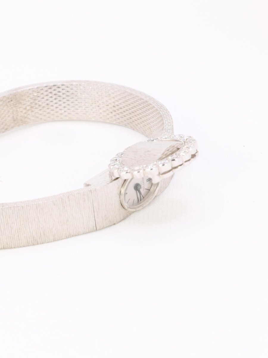 ANDRE COL Montre à secret or blanc diamants - Castafiore