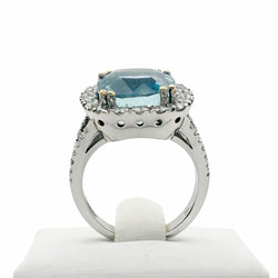 ANILLO EN ORO BLANCO CON AGUAMARINA CENTRAL Y HALO DE DIAMANTES - Castafiore