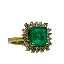 ANILLO EN ORO CON UNA ESMERALDA Y DIAMANTES - Castafiore