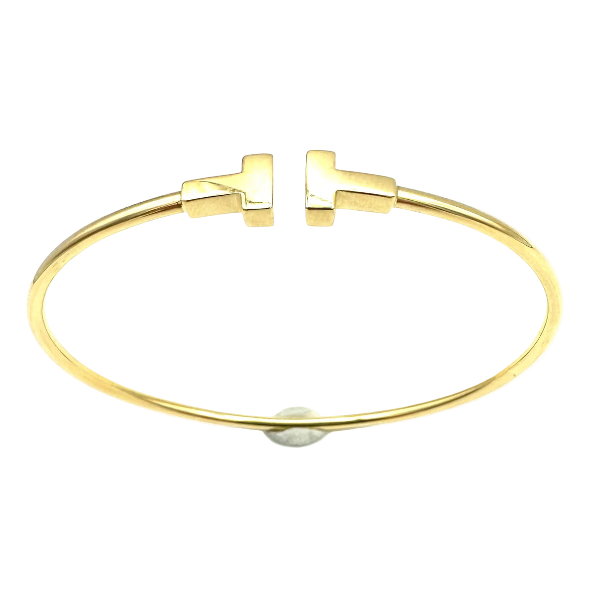 TIFFANY & CO. "Tiffany T" Yellow Gold Bangle