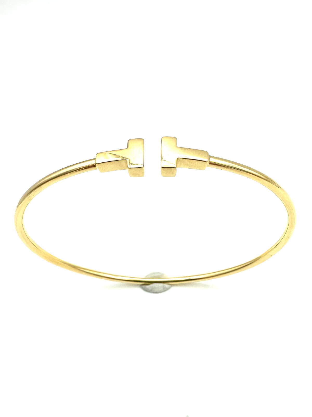 TIFFANY & CO. "Tiffany T" Yellow Gold Bangle Bracelet
