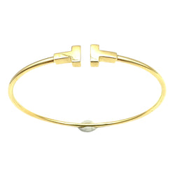 TIFFANY & CO. "Tiffany T" Yellow Gold Bangle