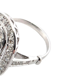 "Entourage" Ring in White Gold, Emerald, and Diamonds