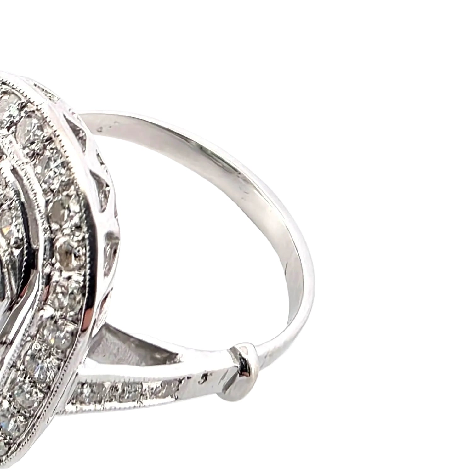 "Entourage" Ring in White Gold, Emerald, and Diamonds
