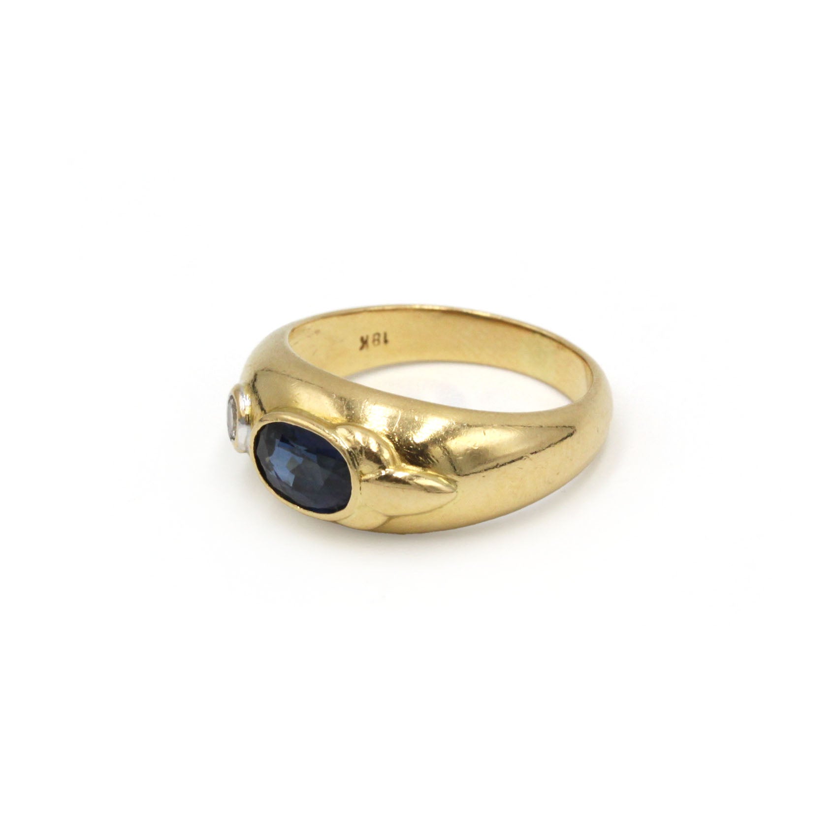 Yellow gold bangle ring with diamonds and sapphires