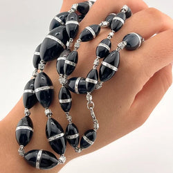R.CAMPELL necklace in platinum, Onyx, and Diamonds