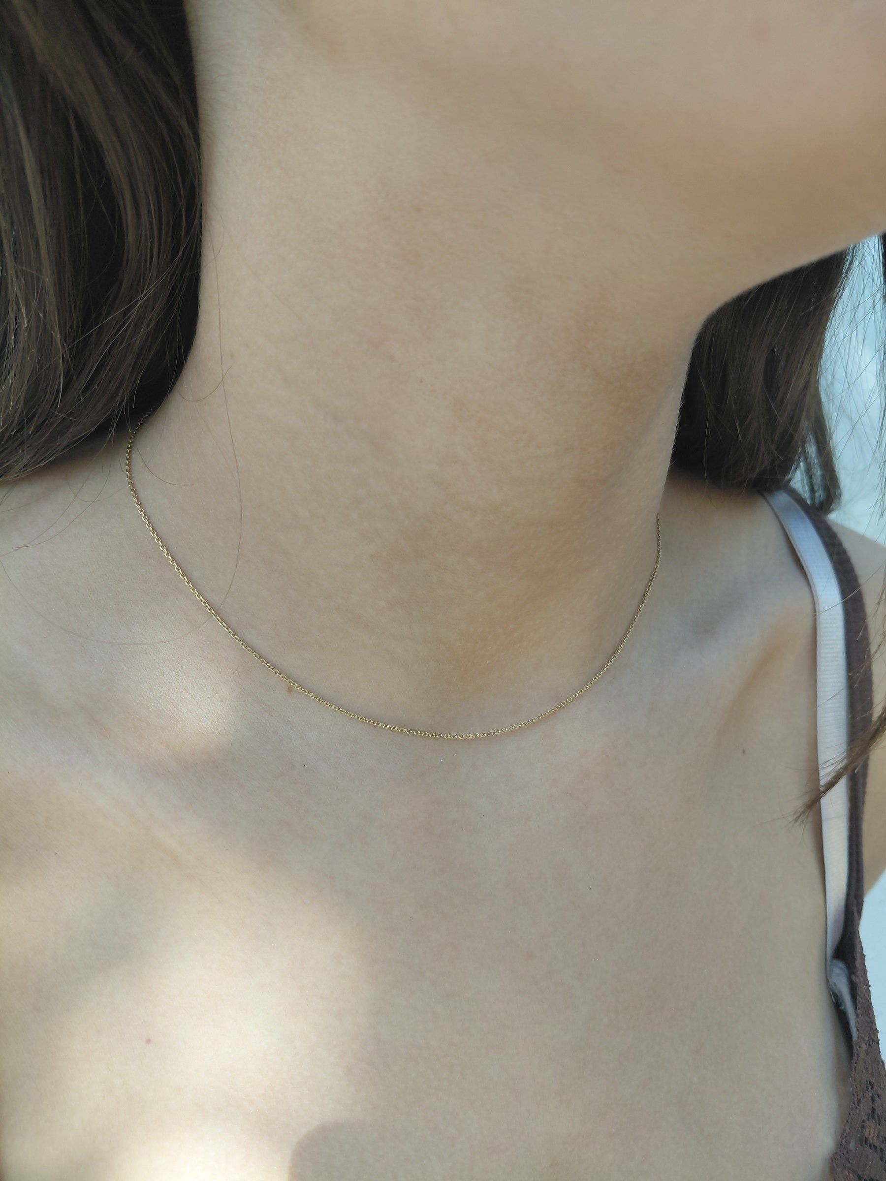 Yellow gold forçat-link chain