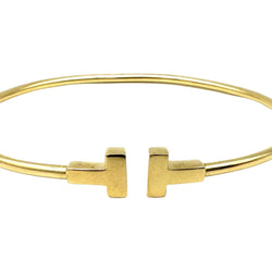 TIFFANY & CO. "Tiffany T" Yellow Gold Bangle