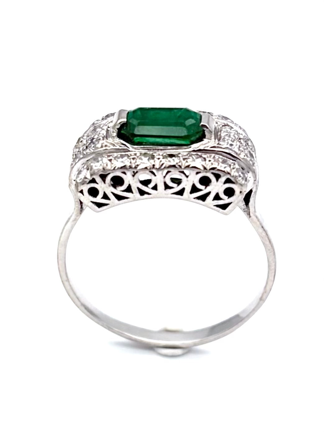 Art Deco ring in gold, platinum, emerald, and diamonds