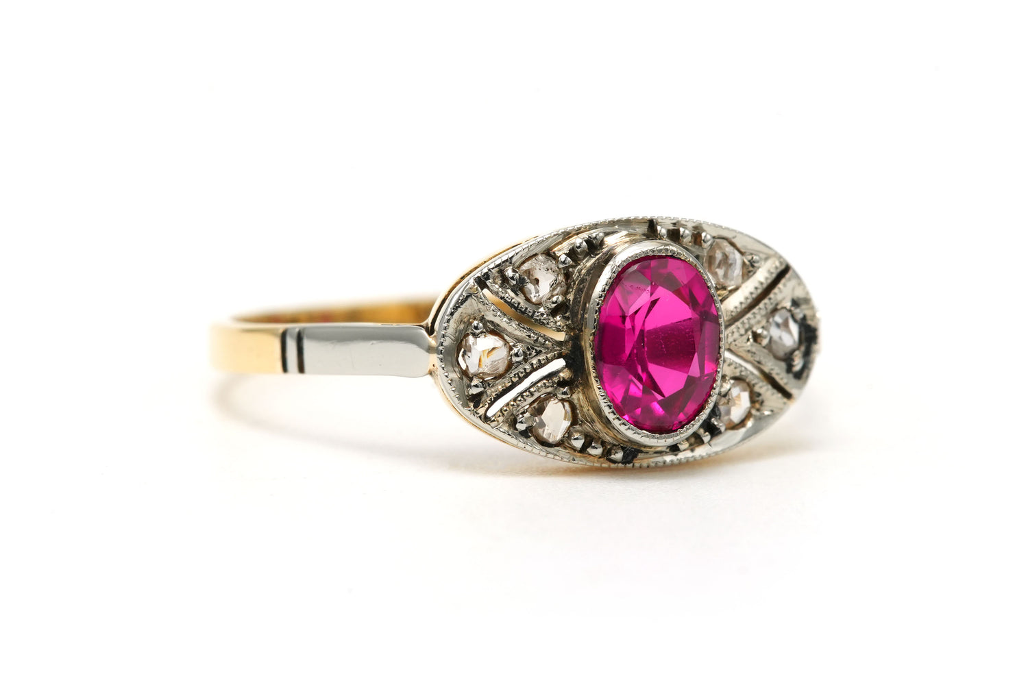 Entourage Ring in white gold, yellow gold, rubies, and diamonds