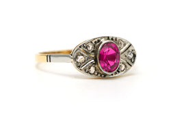 Entourage Ring in white gold, yellow gold, rubies, and diamonds