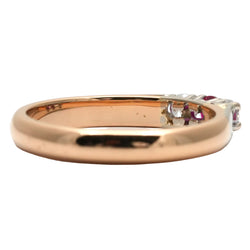Trilogy Ring in white gold, yellow gold, rubies, and diamonds
