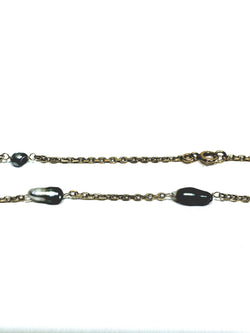 Rose gold long necklace with Tahitian pearls.