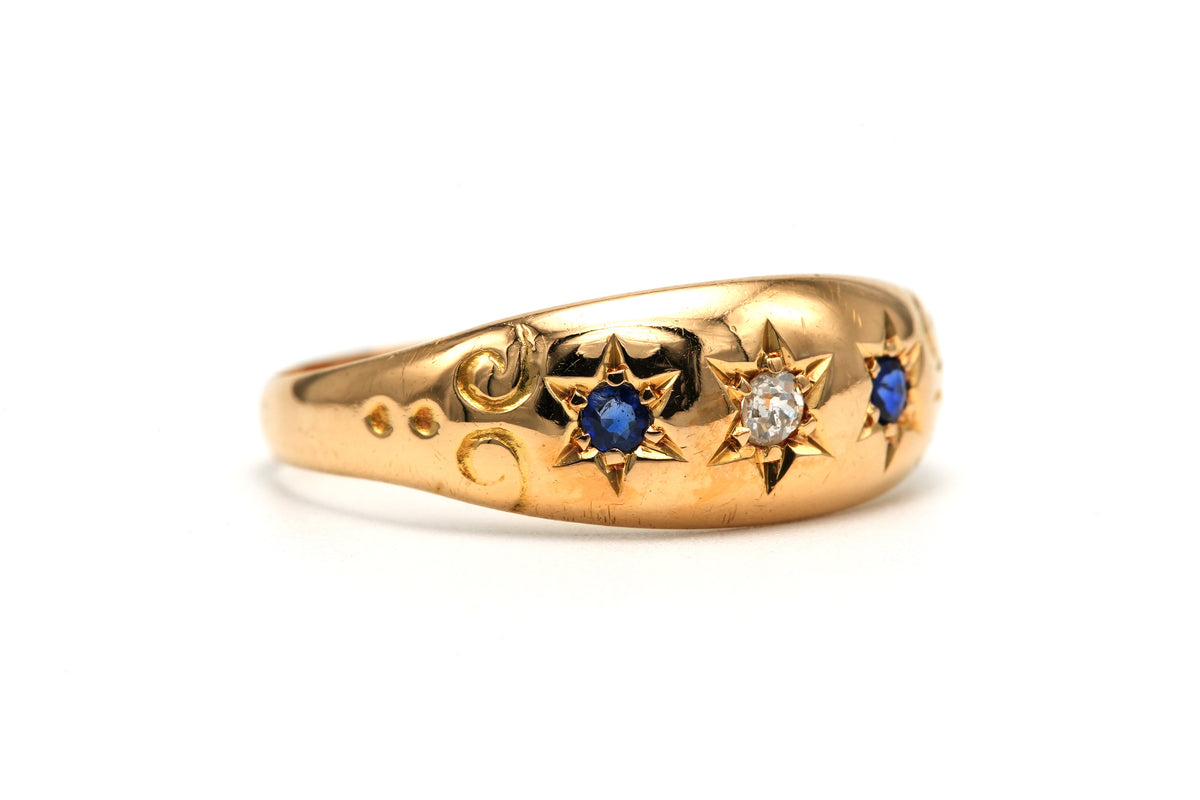 Yellow gold ring with sapphires and diamonds