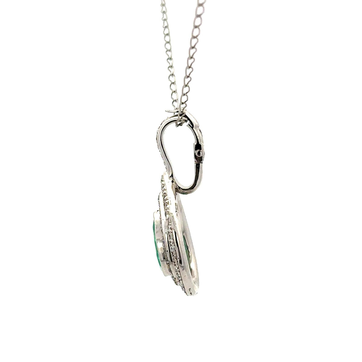 White gold pendant with emeralds and diamonds