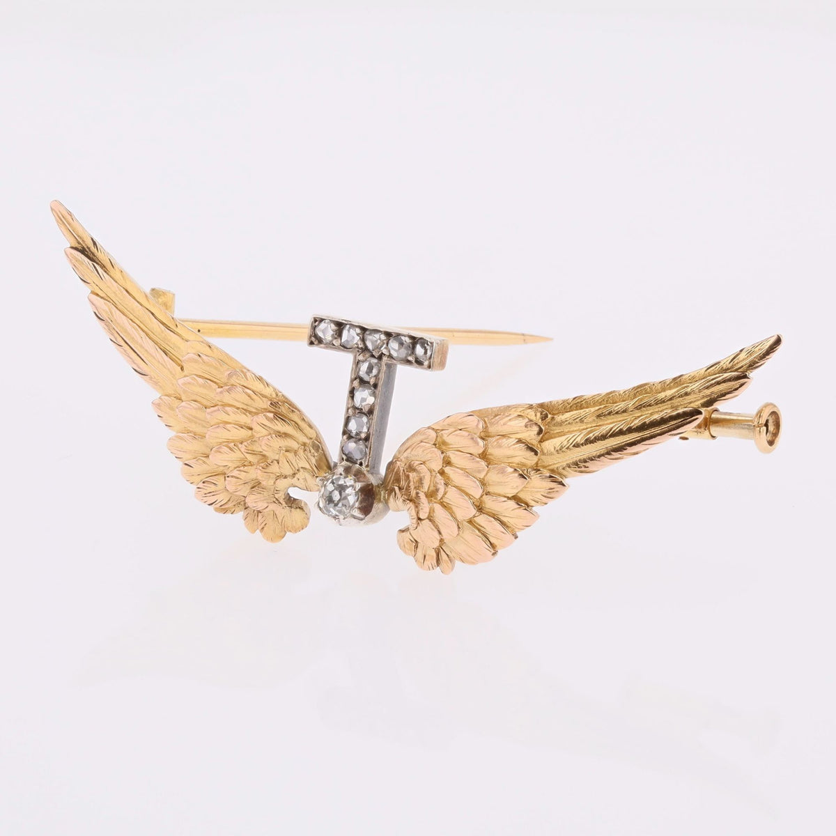 Broche en or jaune, argent et diamants