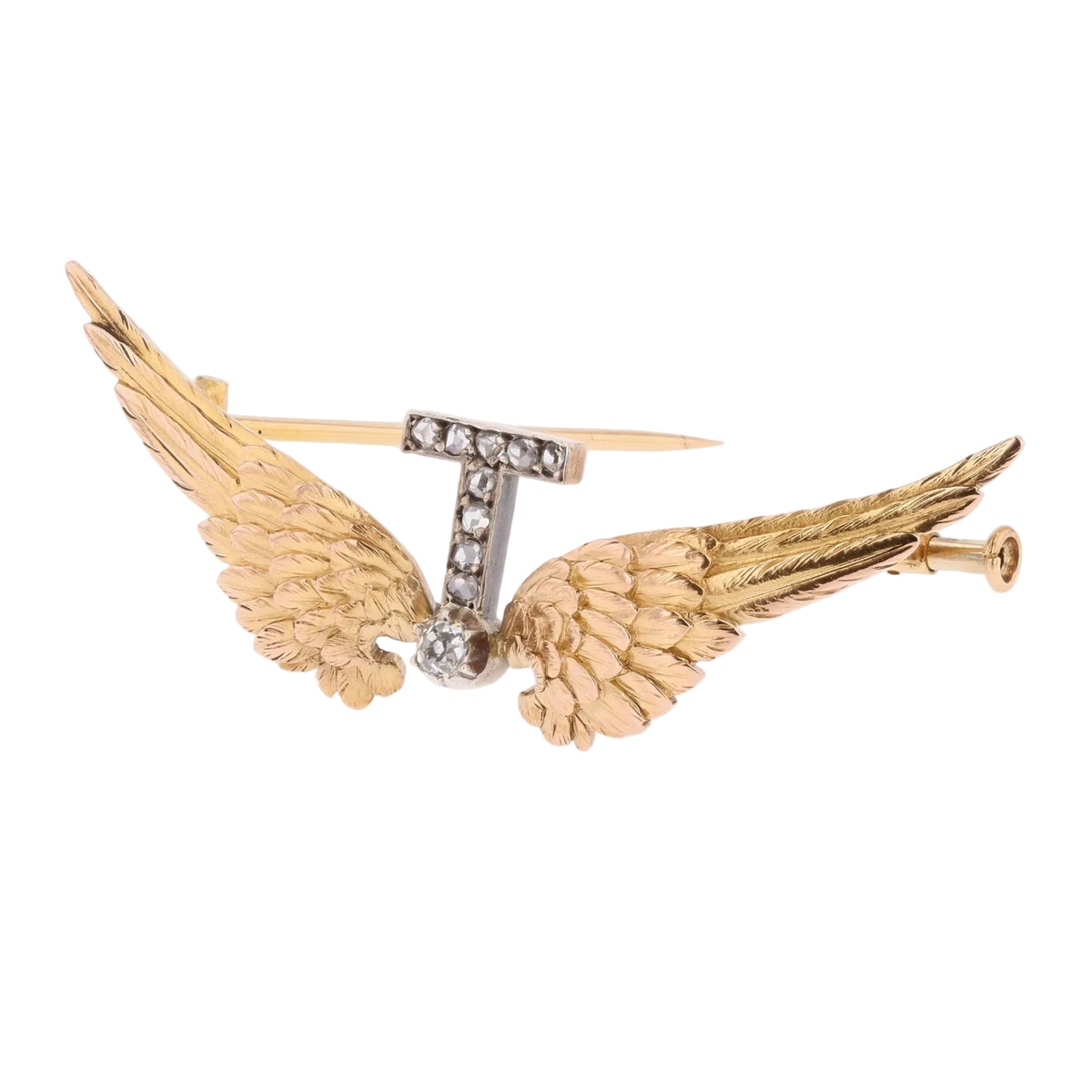 Yellow gold, silver, and diamond brooch