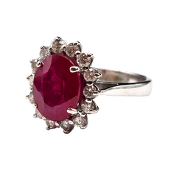 Entourage Ring in white gold, rubies, and diamonds