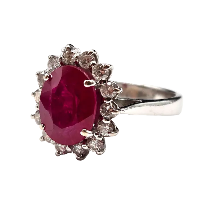 Entourage Ring in white gold, rubies, and diamonds