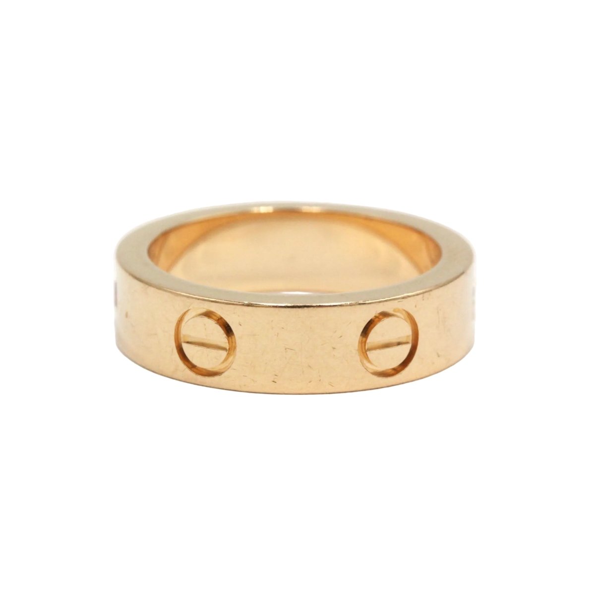 Bague Alliance CARTIER "Love" en or rose et saphir - Castafiore
