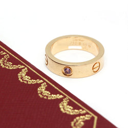 Bague Alliance CARTIER "Love" en or rose et saphir - Castafiore
