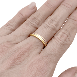 Cartier "Vendôme Louis Cartier" wedding ring, three golds.