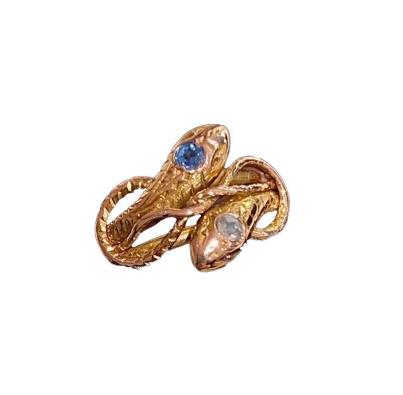 Bague ancienne à deux têtes de serpents en or rose 18k - Castafiore