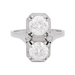 Bague ancienne "Toi & Moi", platine, diamants. - Castafiore