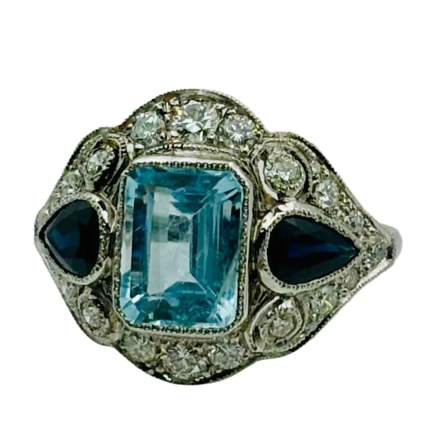 Bague ART DECO Anillo en platine avec aigue - marine, saphirs et diamants - Castafiore
