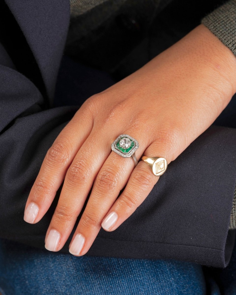 Bague Art déco en platine, émeraudes et diamants - Castafiore