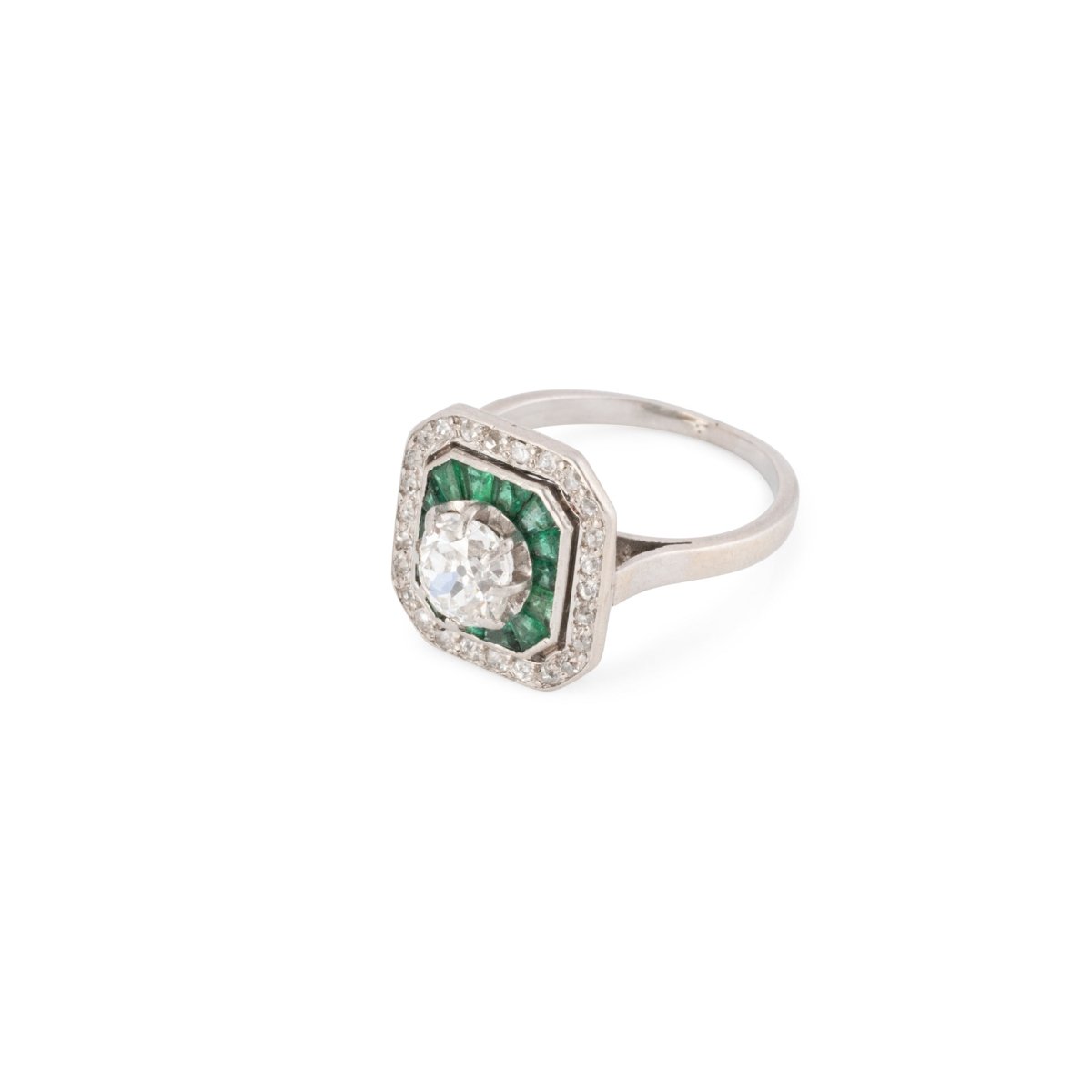 Bague Art déco en platine, émeraudes et diamants - Castafiore