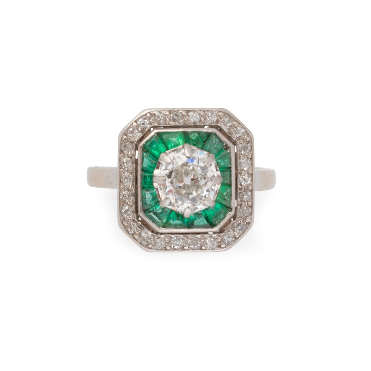 Bague Art déco en platine, émeraudes et diamants - Castafiore