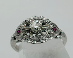 Bague art déco en platine et diamants et rubis - Castafiore