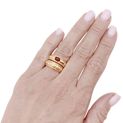 Bague Bandeau BOUCHERON en or jaune et rubis - Castafiore