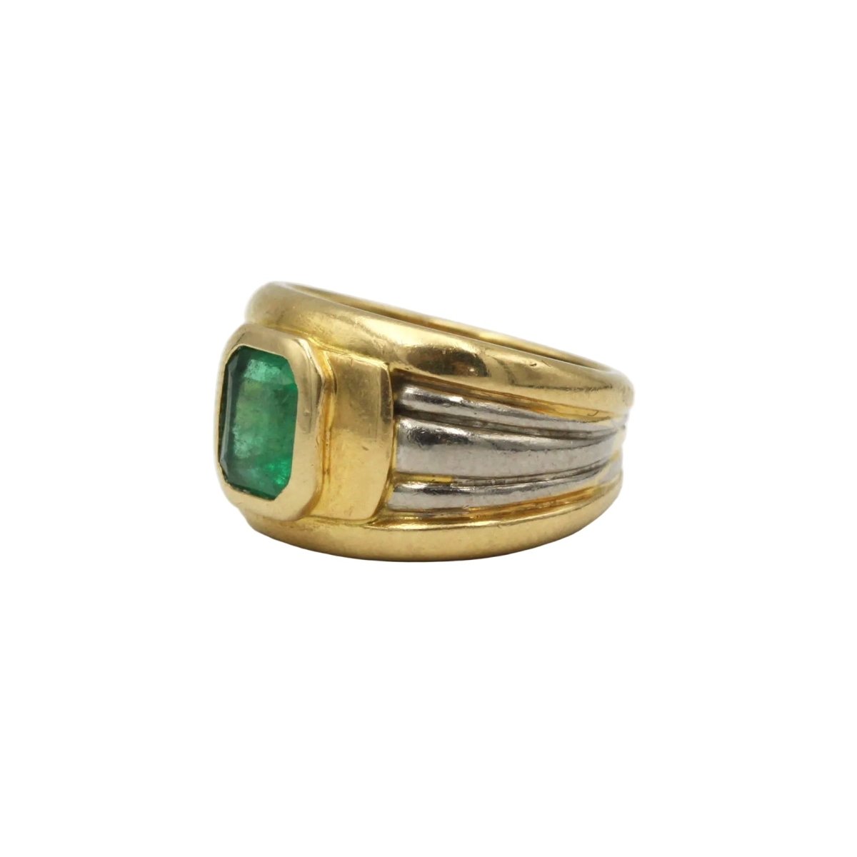 Bague Bandeau en or blanc, or jaune et émeraude - Castafiore