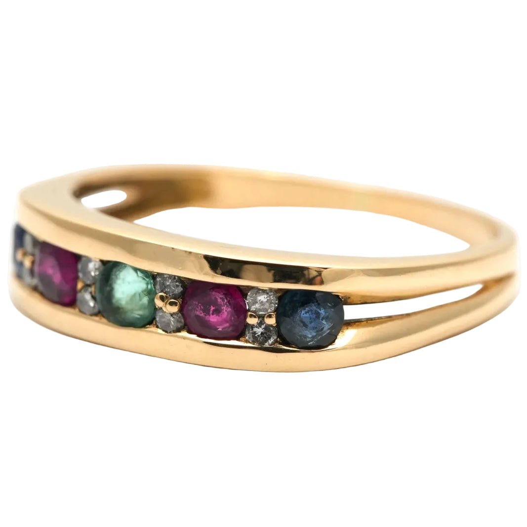 Bague Bandeau en or jaune, émeraude, rubis, saphirs et diamants - Castafiore