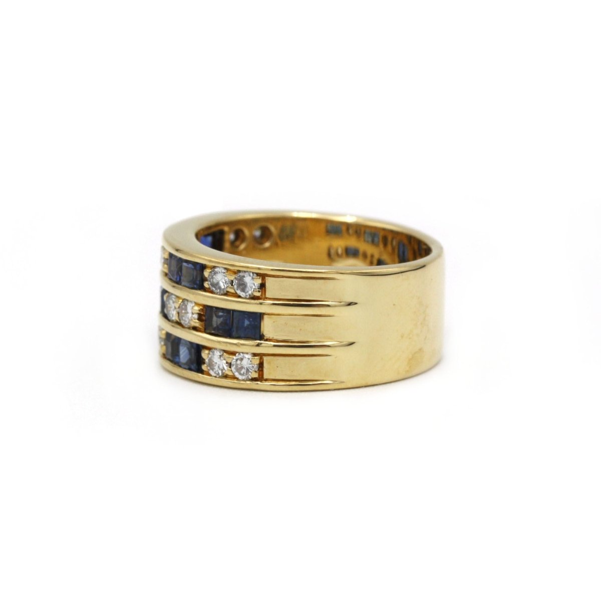 Bague Bandeau en or jaune, saphirs et diamants - Castafiore