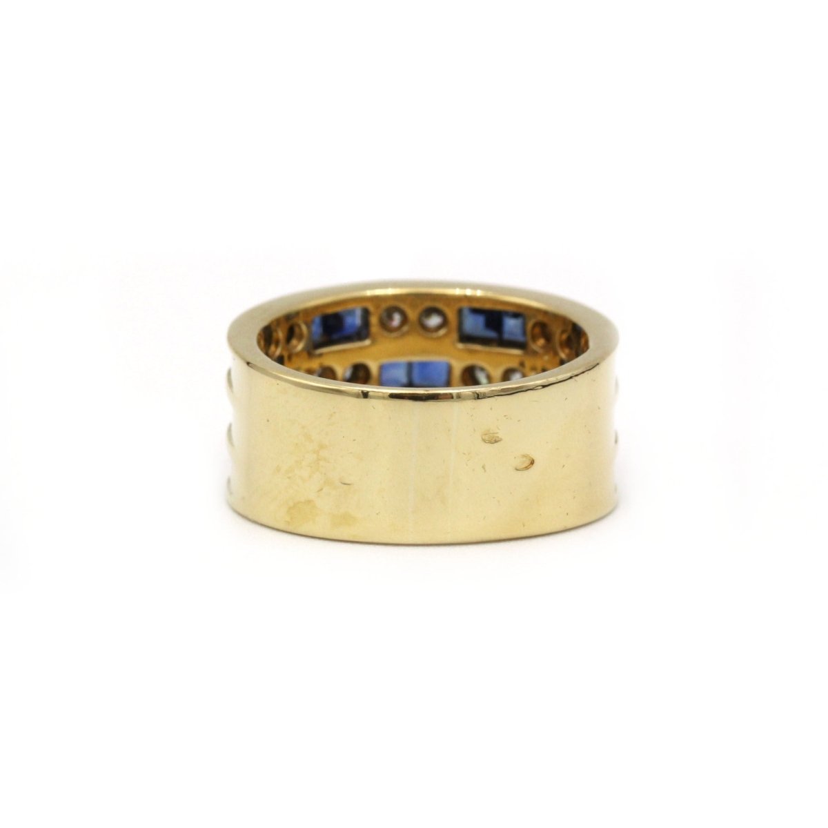 Bague Bandeau en or jaune, saphirs et diamants - Castafiore