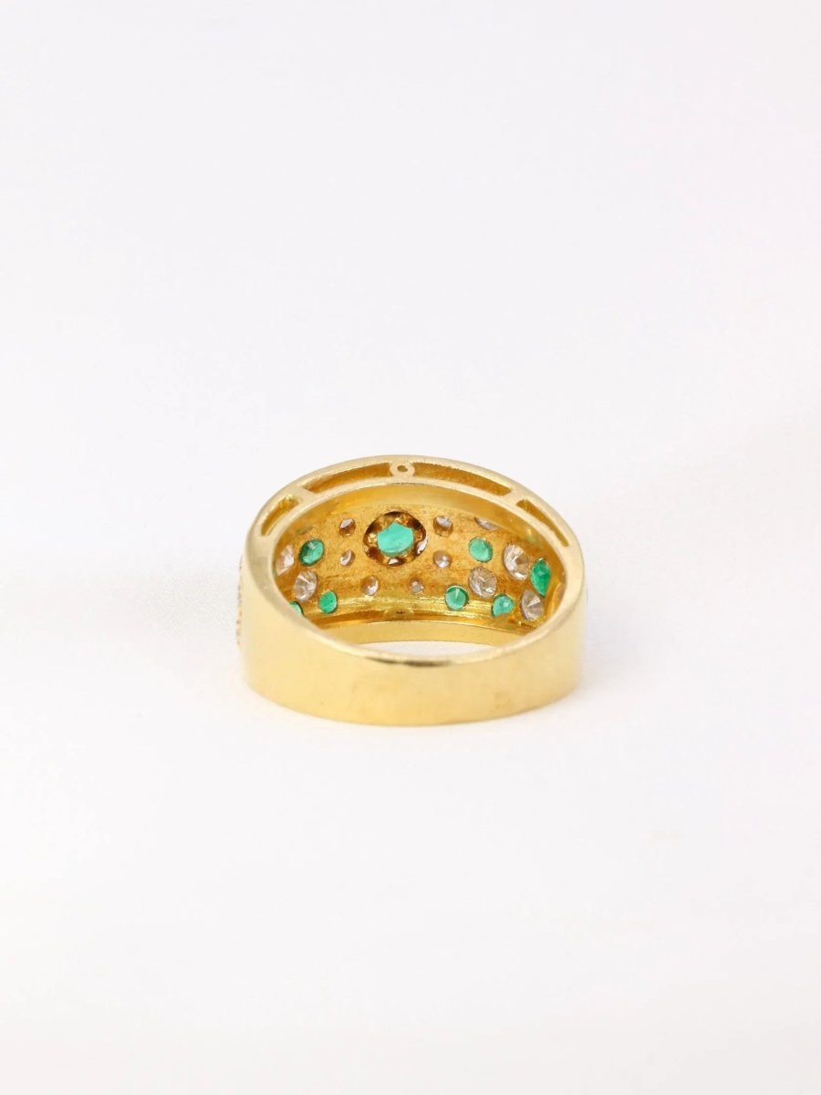 Bague bandeau vintage en or jaune, diamants et émeraudes - Castafiore