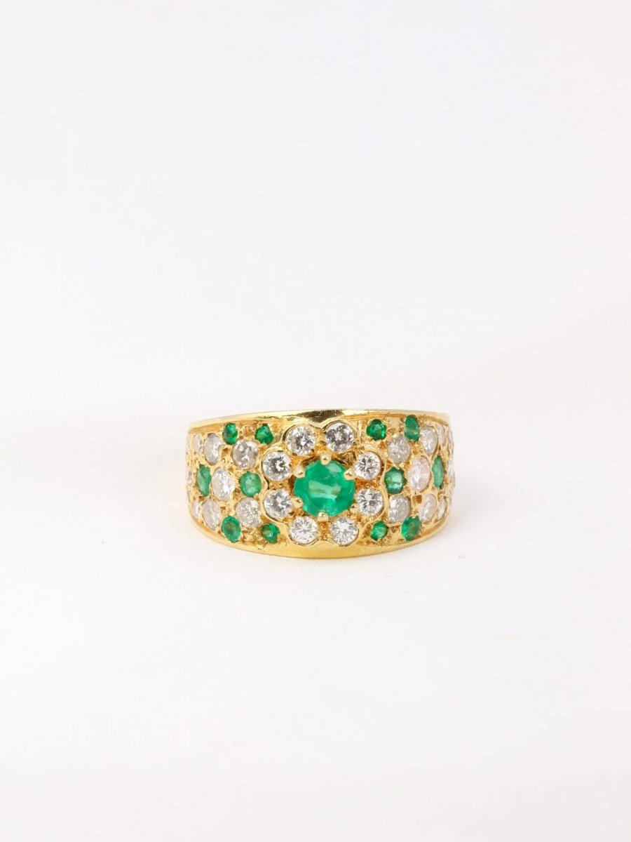 Bague bandeau vintage en or jaune, diamants et émeraudes - Castafiore
