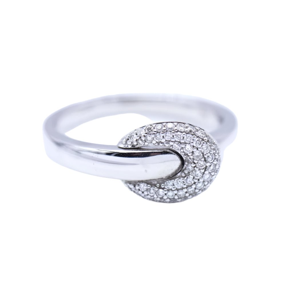 Bague Boucle en or blanc et diamants. - Castafiore
