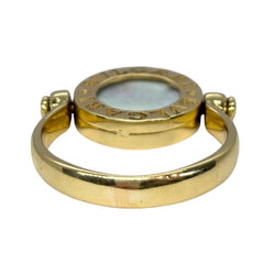 Bague BULGARI "Réversible" en or jaune, nacre et onyx - Castafiore