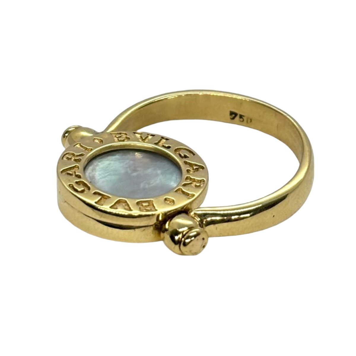 Bague BULGARI "Réversible" en or jaune, nacre et onyx - Castafiore