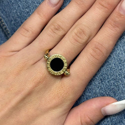 Bague BULGARI "Réversible" en or jaune, nacre et onyx - Castafiore