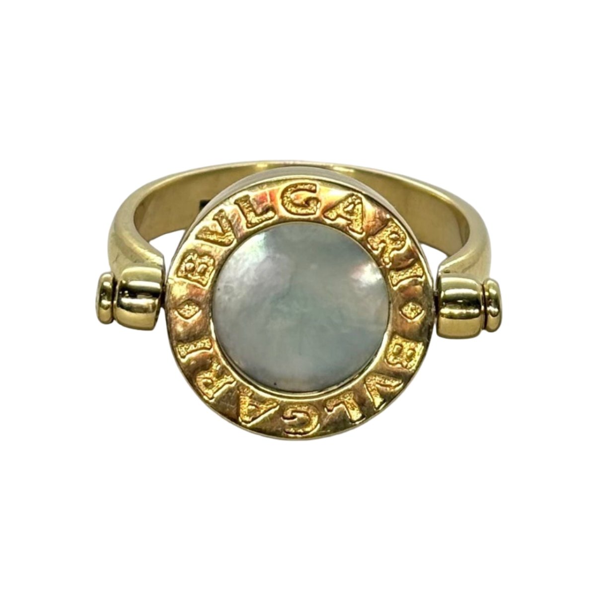 Bague BULGARI "Réversible" en or jaune, nacre et onyx - Castafiore