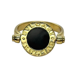 Bague BULGARI "Réversible" en or jaune, nacre et onyx - Castafiore