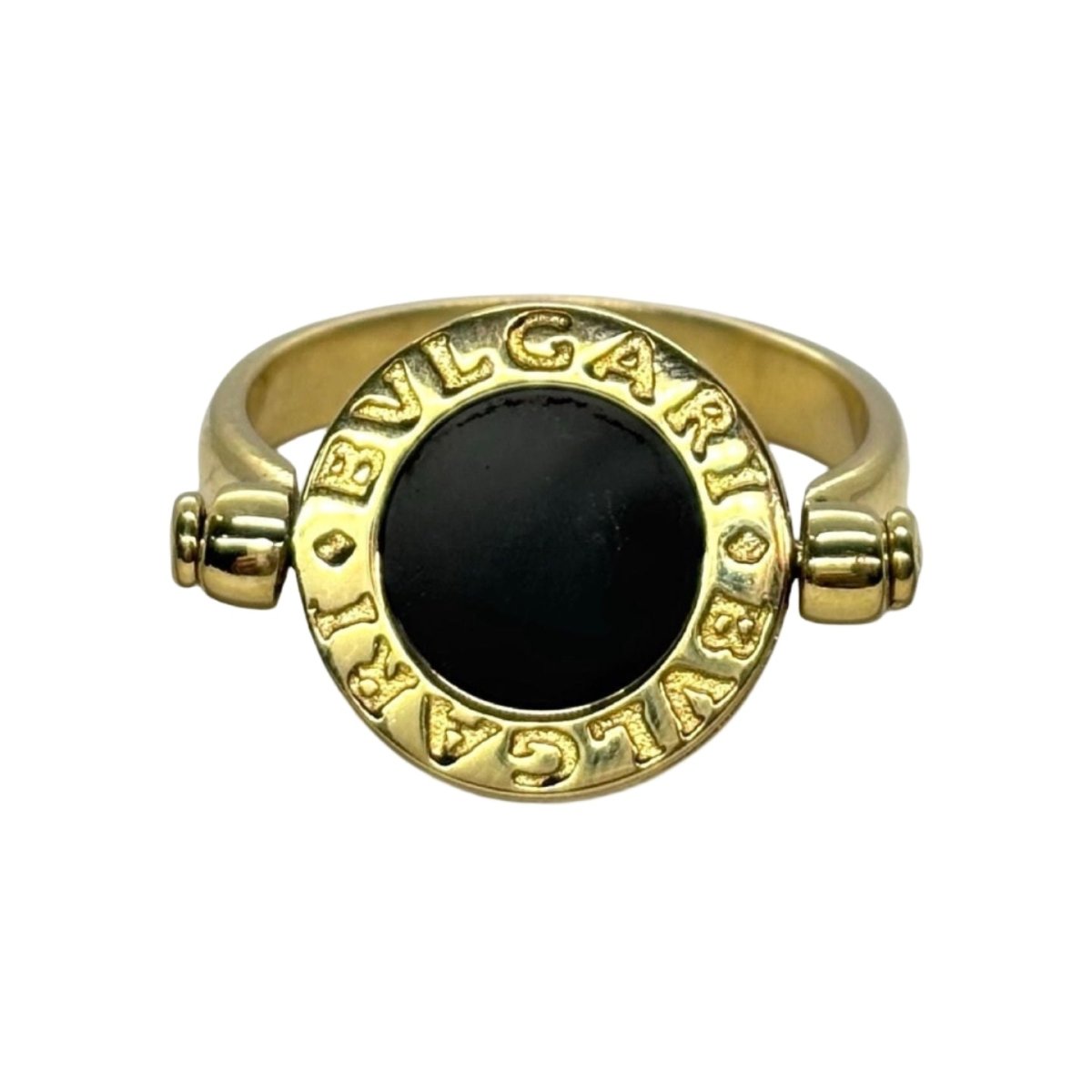 Bague BULGARI "Réversible" en or jaune, nacre et onyx - Castafiore
